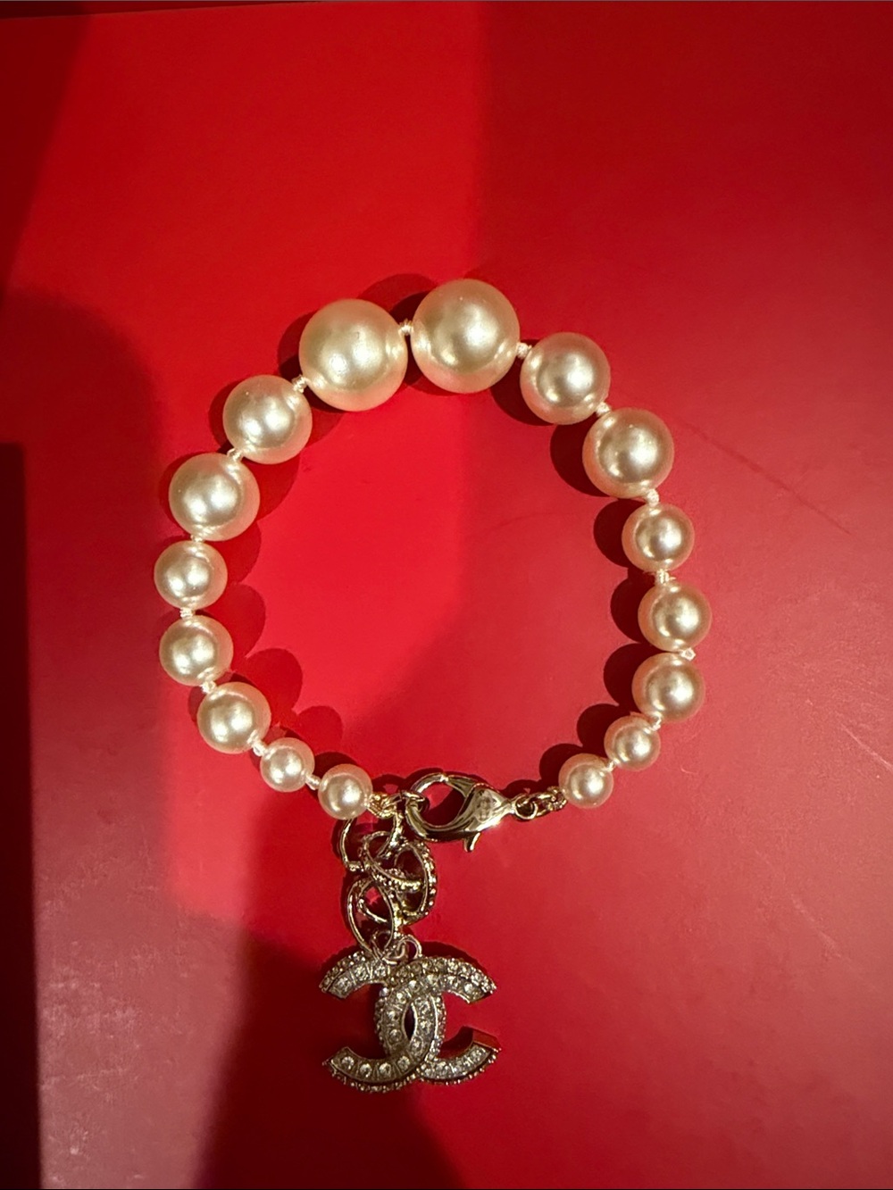 CHANEL Pearl Bracelet with Silver-Tone Crystal CC Charm - Ivory Pearls